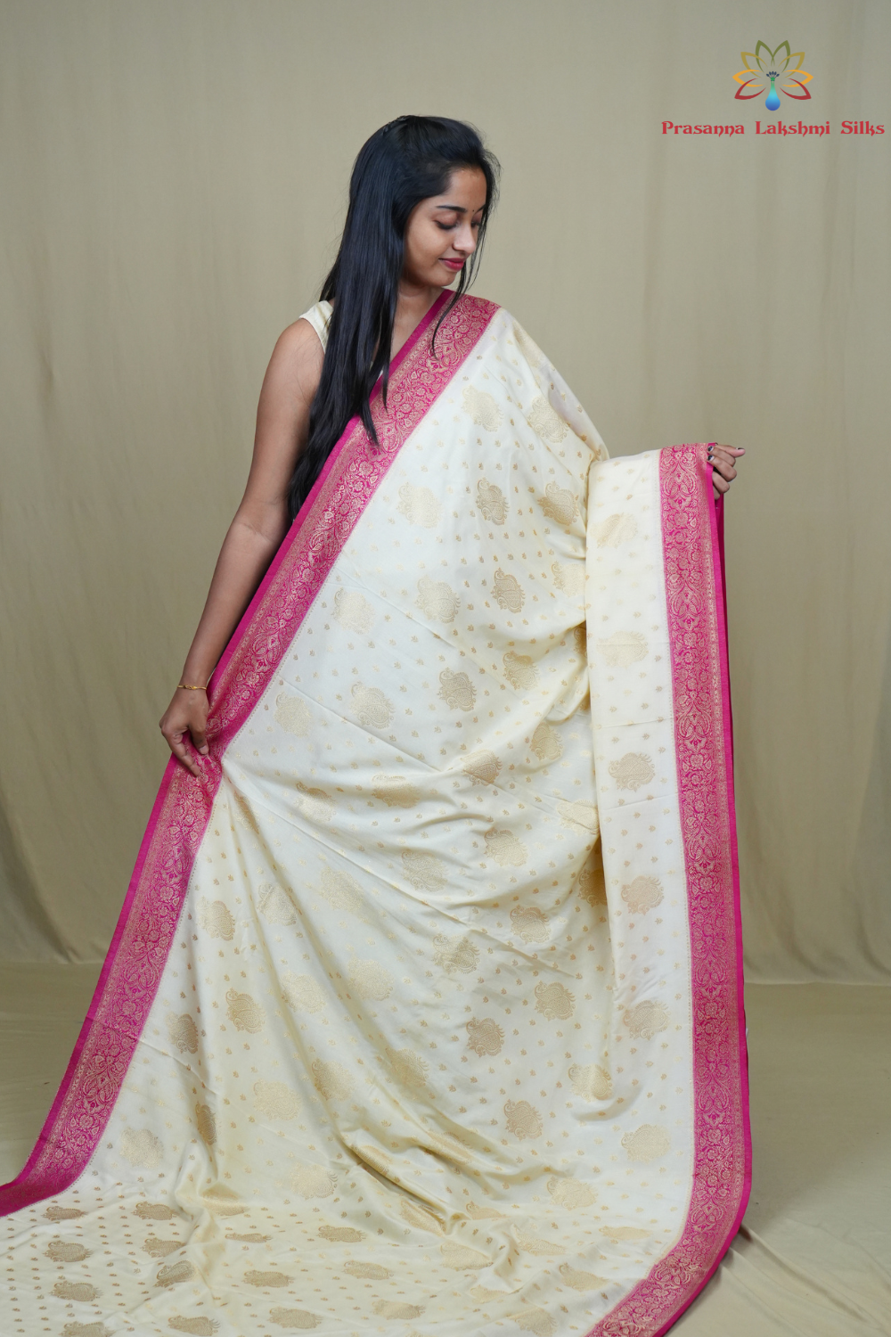Elegant Mysore silk saree featuring contrast zari woven borders and matching blouse.
