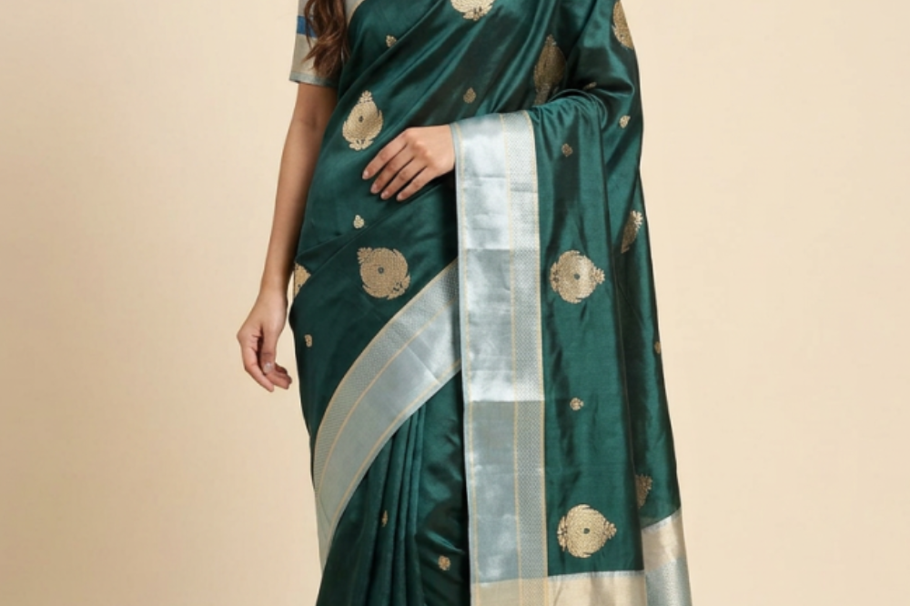 Luxury Banarasi Mashru saree featuring allover big zari woven motifs, Meenakari detailing, contrast satin border, rich brocade pallu, and contrast blouse.
