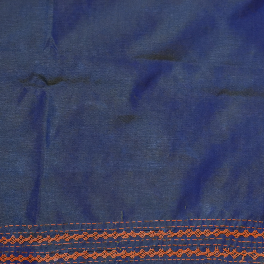 Semi Bangalore Silk Saree with all-over Kutch work motifs and rich embroidered pallu.
