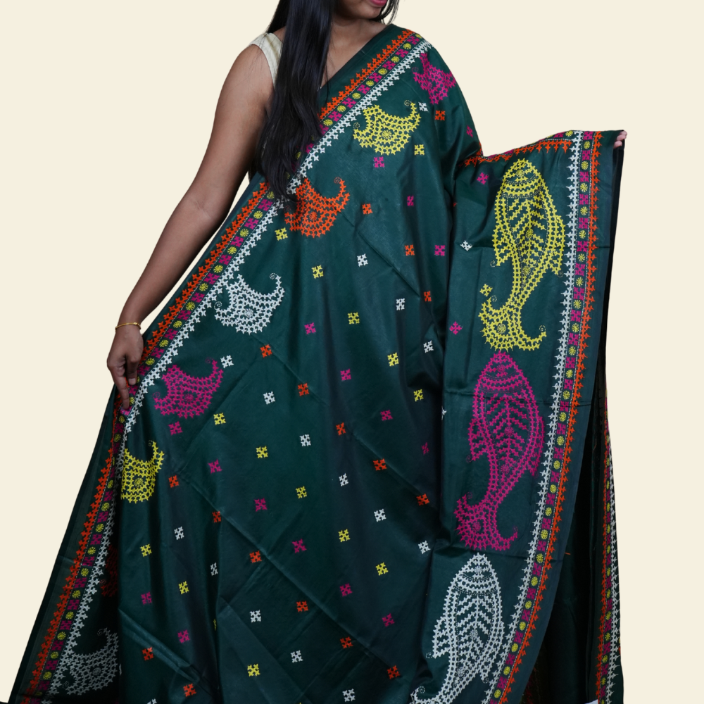 Elegant silk saree featuring Kantha work borders and detailed Kantha pallu design.
