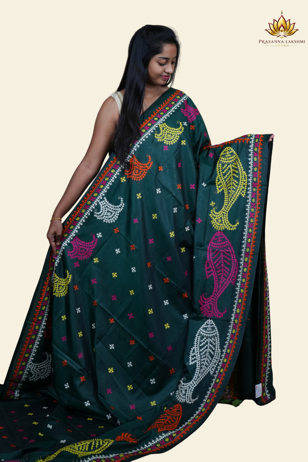 Elegant silk saree featuring Kantha work borders and detailed Kantha pallu design.
