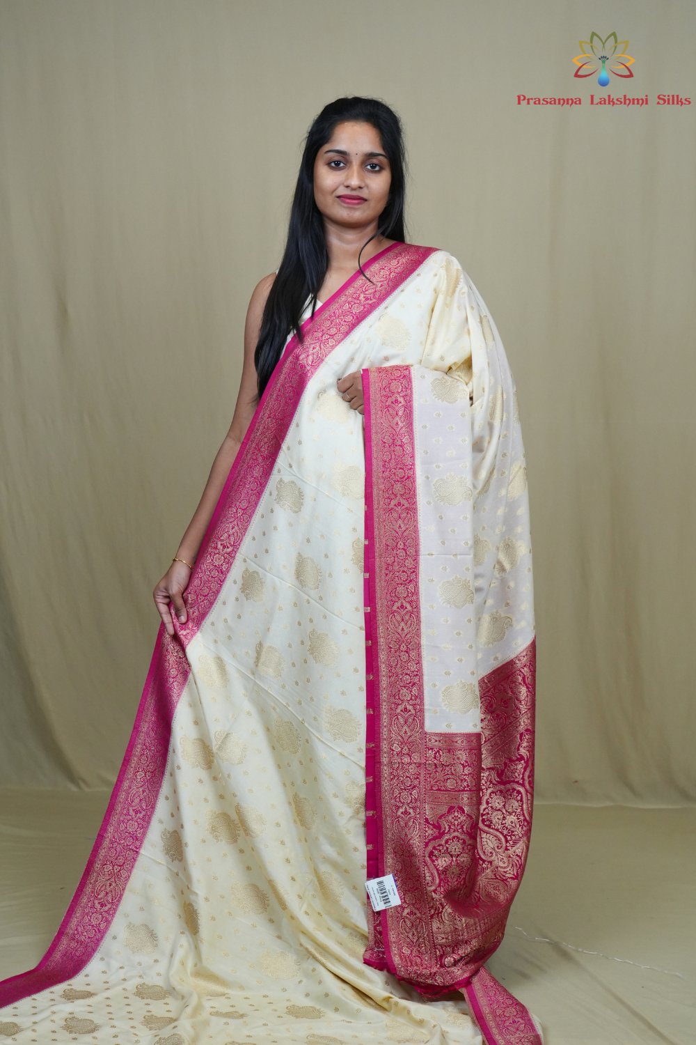 Semi Mysore silk saree with all-over zari woven motifs and rich brocade pallu.
