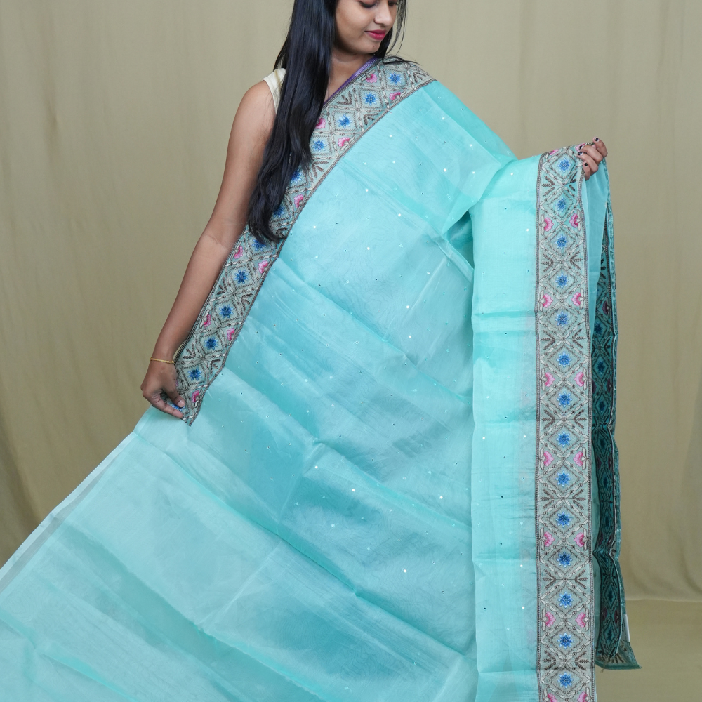 Traditional lightweight Organza Saree suitable for weddings and festive occasions with mirror work.