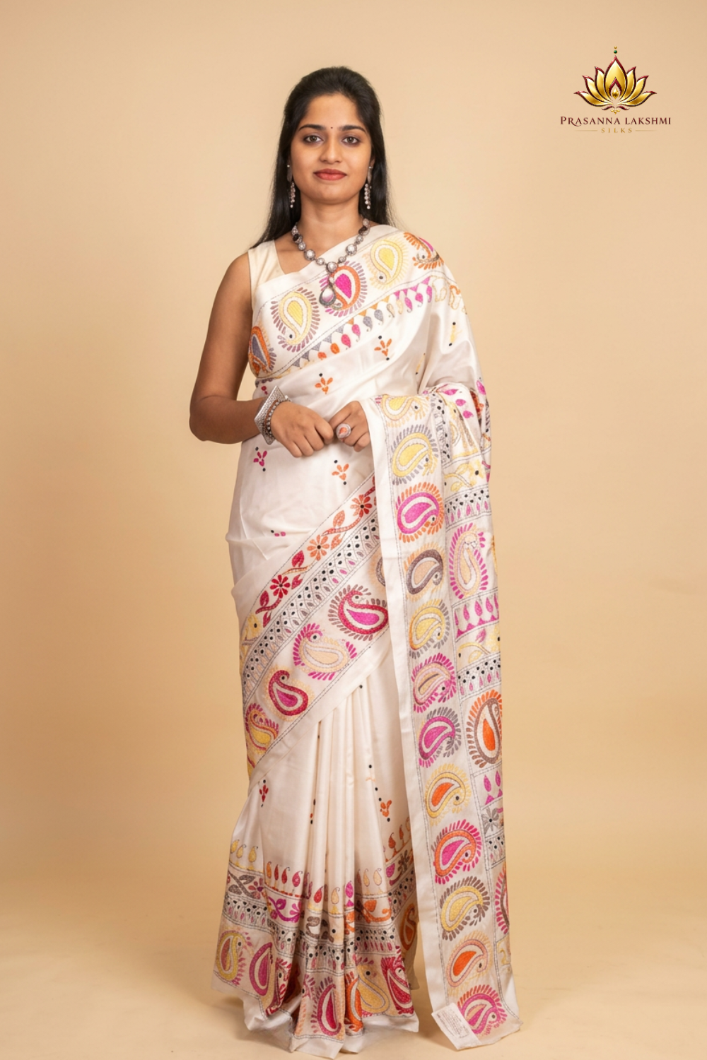 Semi Bangalore silk saree with all-over hand Kantha work and rich embroidered pallu.
