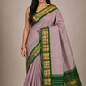 Lightweight Gadwal cotton saree featuring elegant zari border and striped pallu design.

