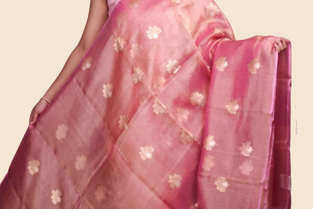 Zari stripe blouse paired with Kora tissue saree
