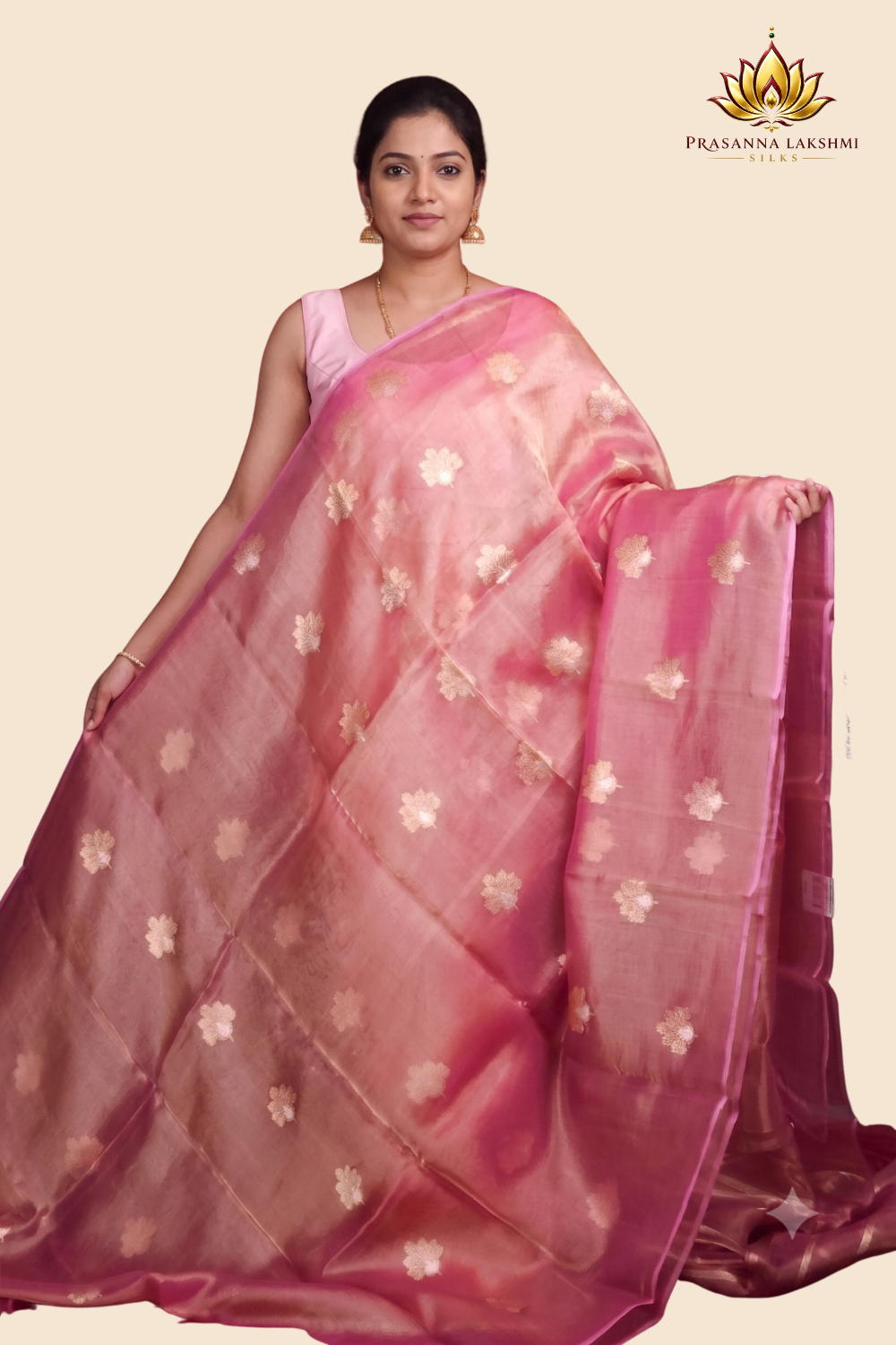 Zari stripe blouse paired with Kora tissue saree
