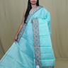 Organza Saree with all-over small mirror work and thread-woven tissue floral borders.
