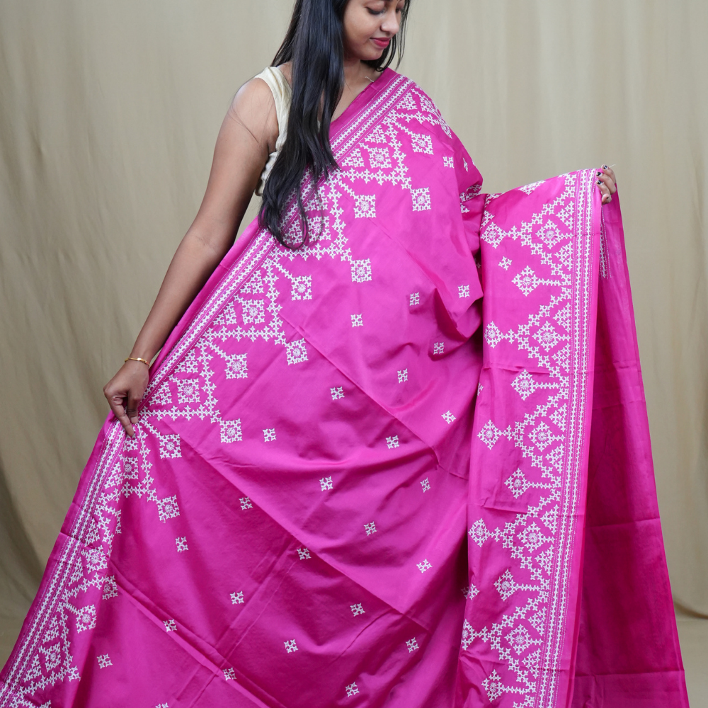 Traditional semi silk saree featuring beautiful hand Kutch work borders and artistic design.
