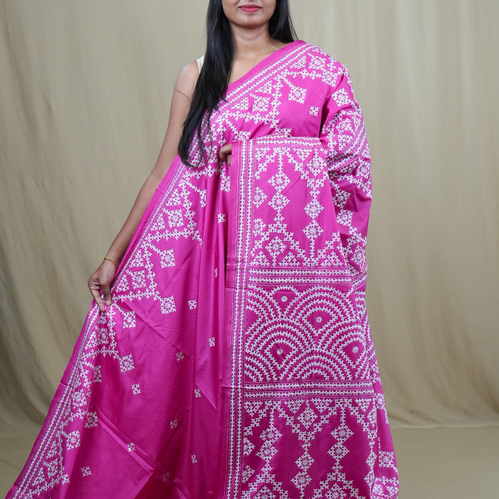 Semi Bangalore Silk Saree with all-over Kutch work motifs and rich embroidered pallu.
