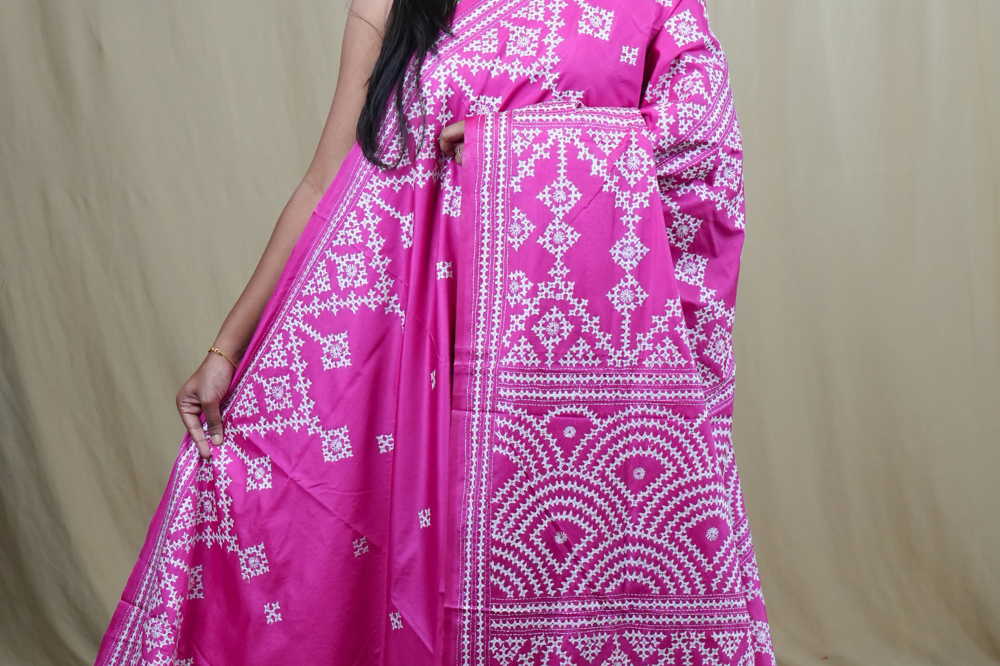 Semi Bangalore Silk Saree with all-over Kutch work motifs and rich embroidered pallu.
