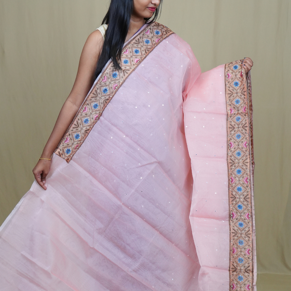 Traditional lightweight Organza Saree suitable for weddings and festive occasions with mirror work.