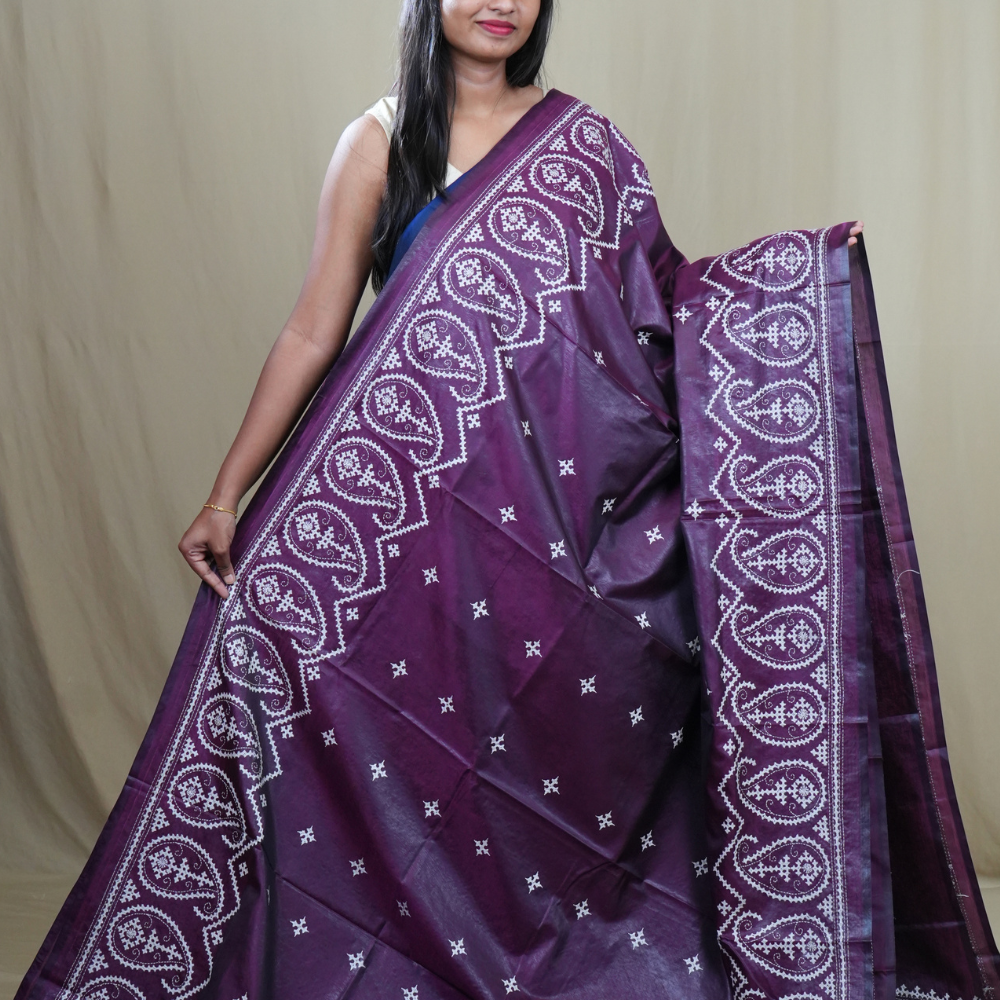 Traditional semi silk saree featuring beautiful hand Kutch work borders and artistic design.
