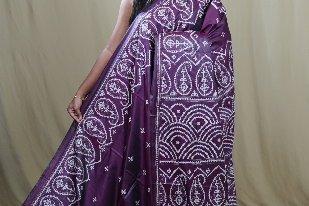 Semi Bangalore Silk Saree with all-over Kutch work motifs and rich embroidered pallu.
