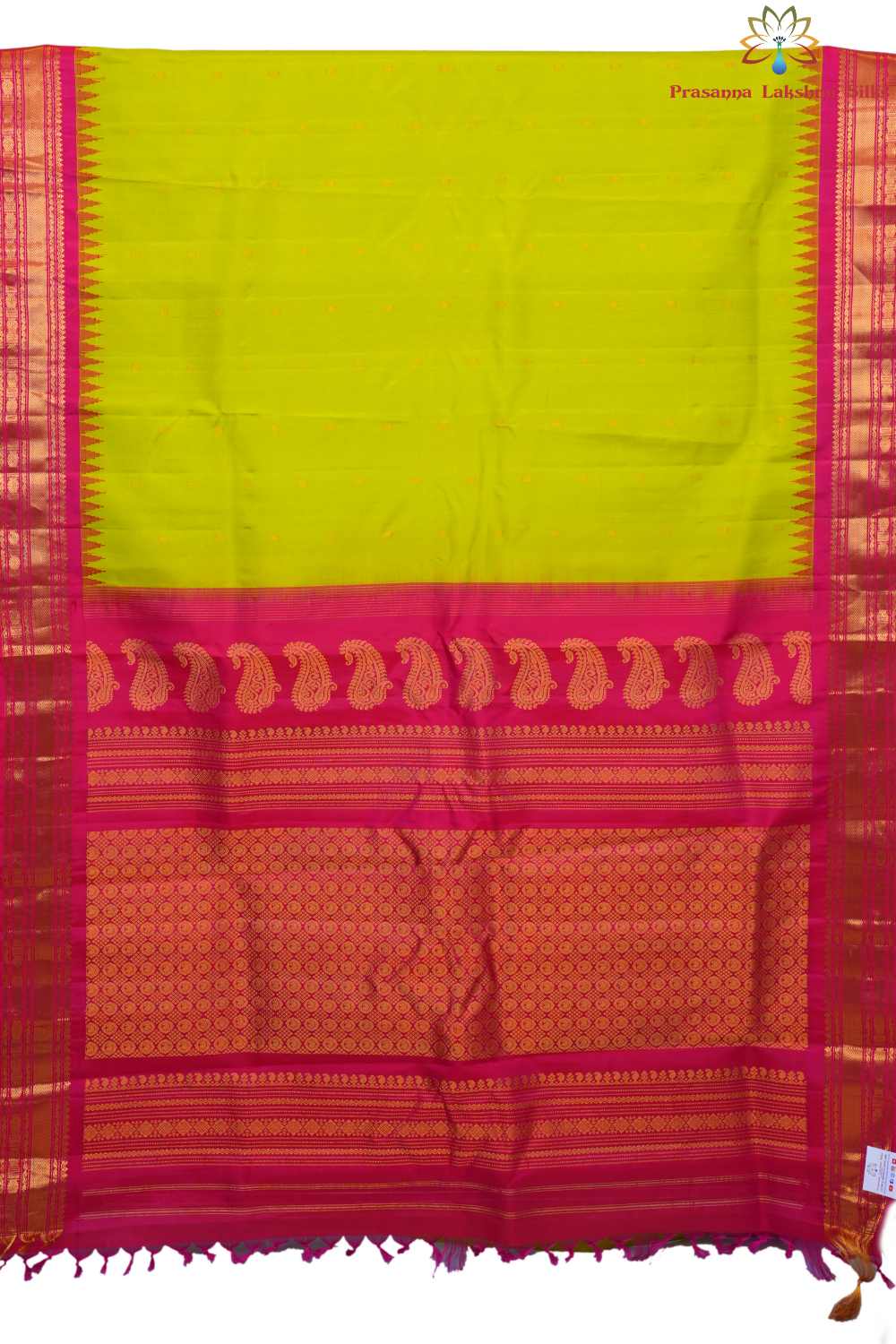 Handloom Gadwal pure silk saree with intricate small zari motifs and rich woven pallu.
