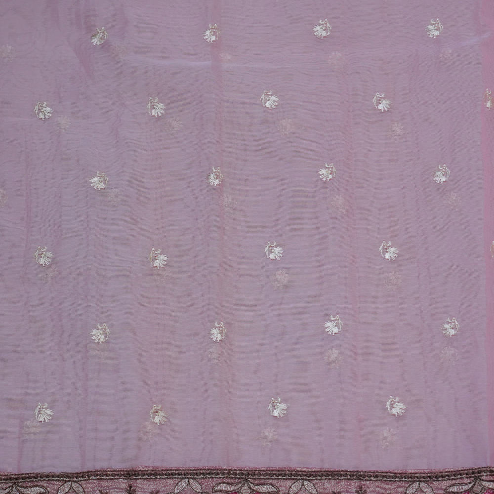 Elegant ethnic organza saree featuring floral pallu design and matching running blouse.
