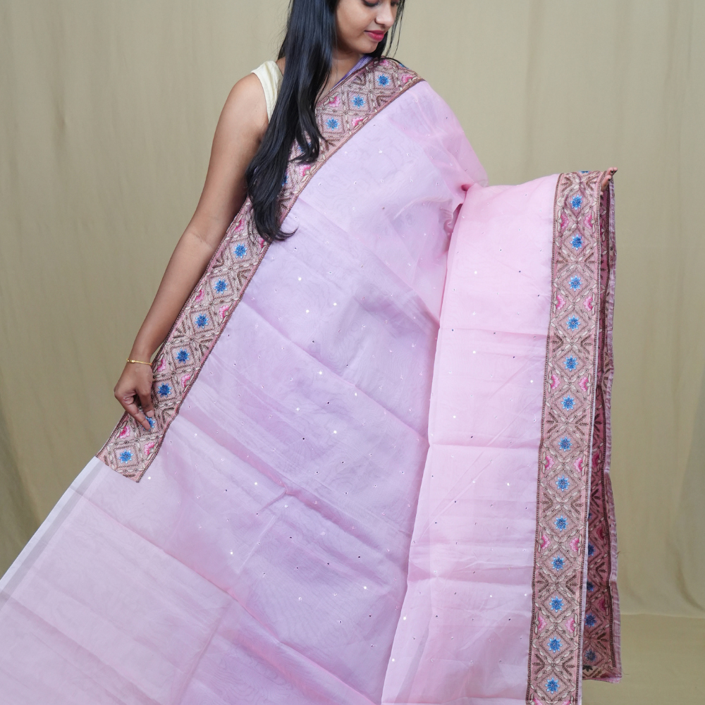 Traditional lightweight Organza Saree suitable for weddings and festive occasions with mirror work.
