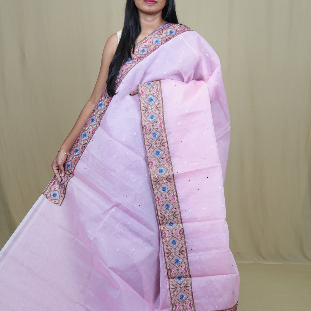 Organza Saree with all-over small mirror work and thread-woven tissue floral borders.
