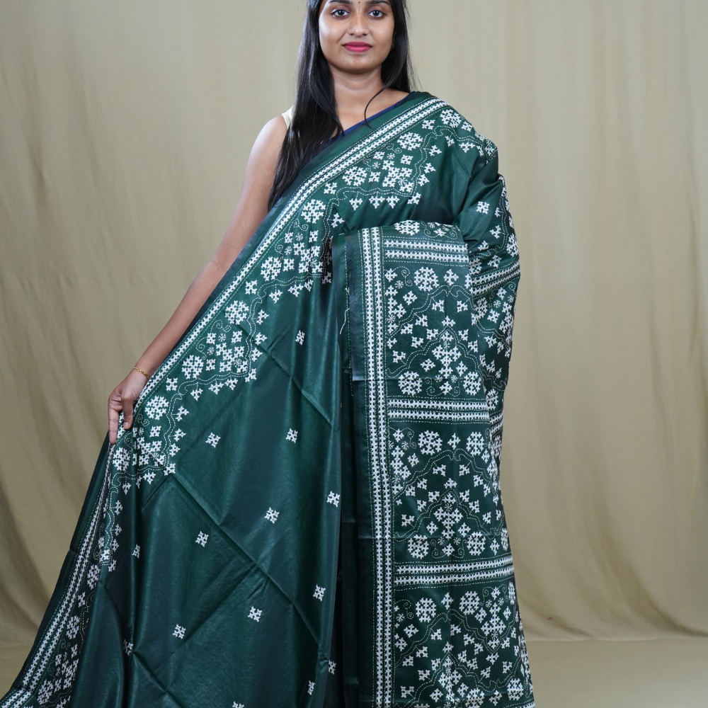 Semi Bangalore Silk Saree with all-over Kutch work motifs and rich embroidered pallu.
