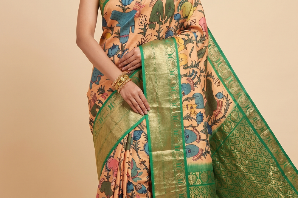 Pure Hand Pen Kalamkari saree with intricate hand-painted designs
