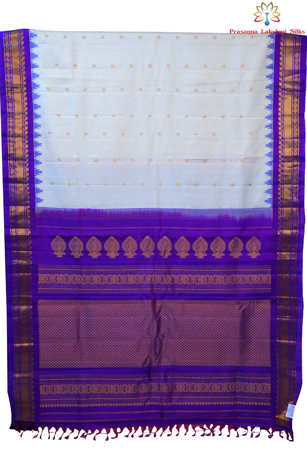 Handloom Gadwal pure silk saree with intricate small zari motifs and rich woven pallu.
