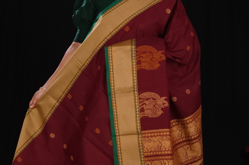 Handloom Kanjeevaram cotton saree with temple motifs
