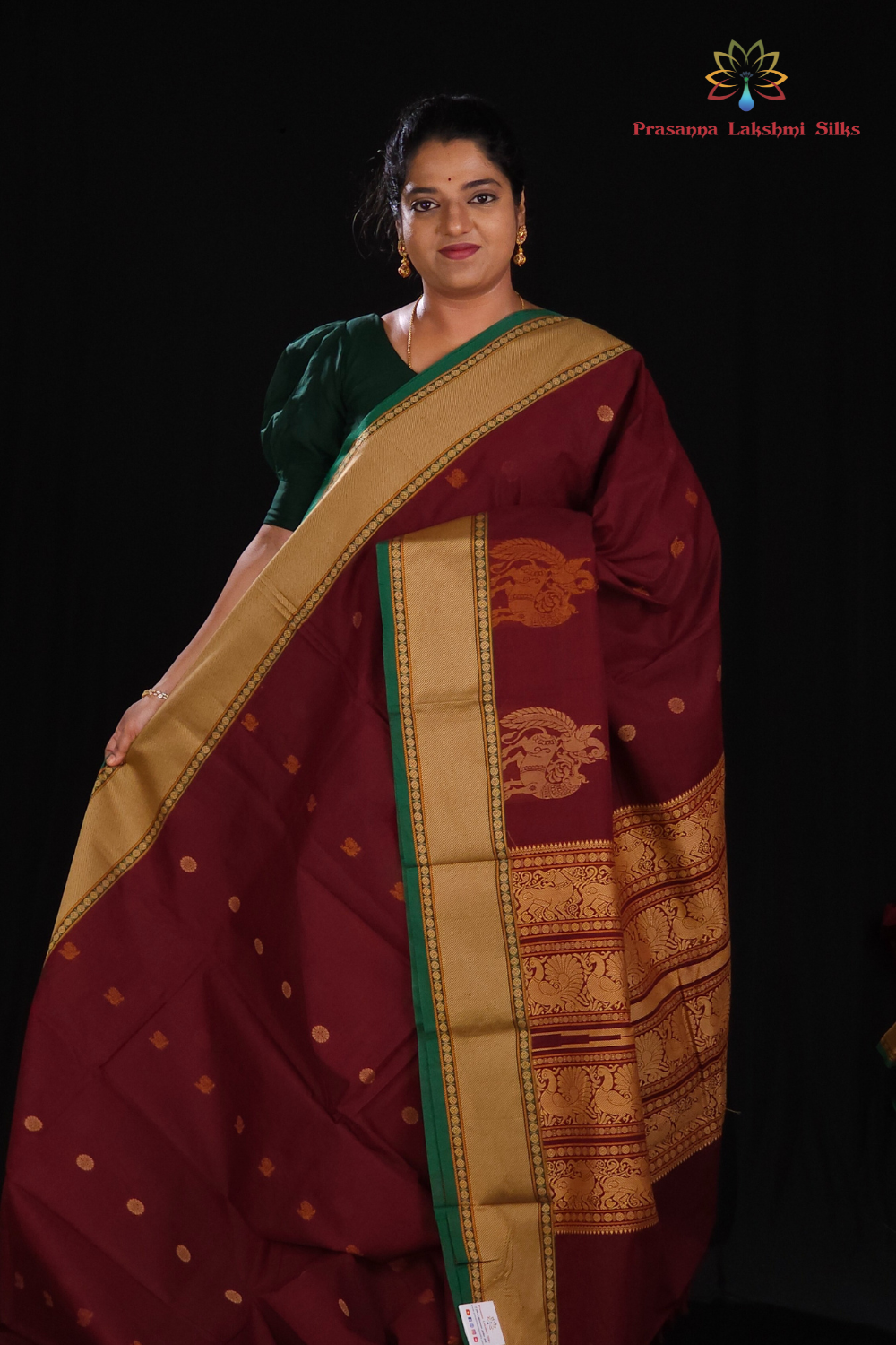 Handloom Kanjeevaram cotton saree with temple motifs
