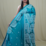 Semi Bangalore Silk Saree with all-over Kutch work motifs and rich embroidered pallu.
