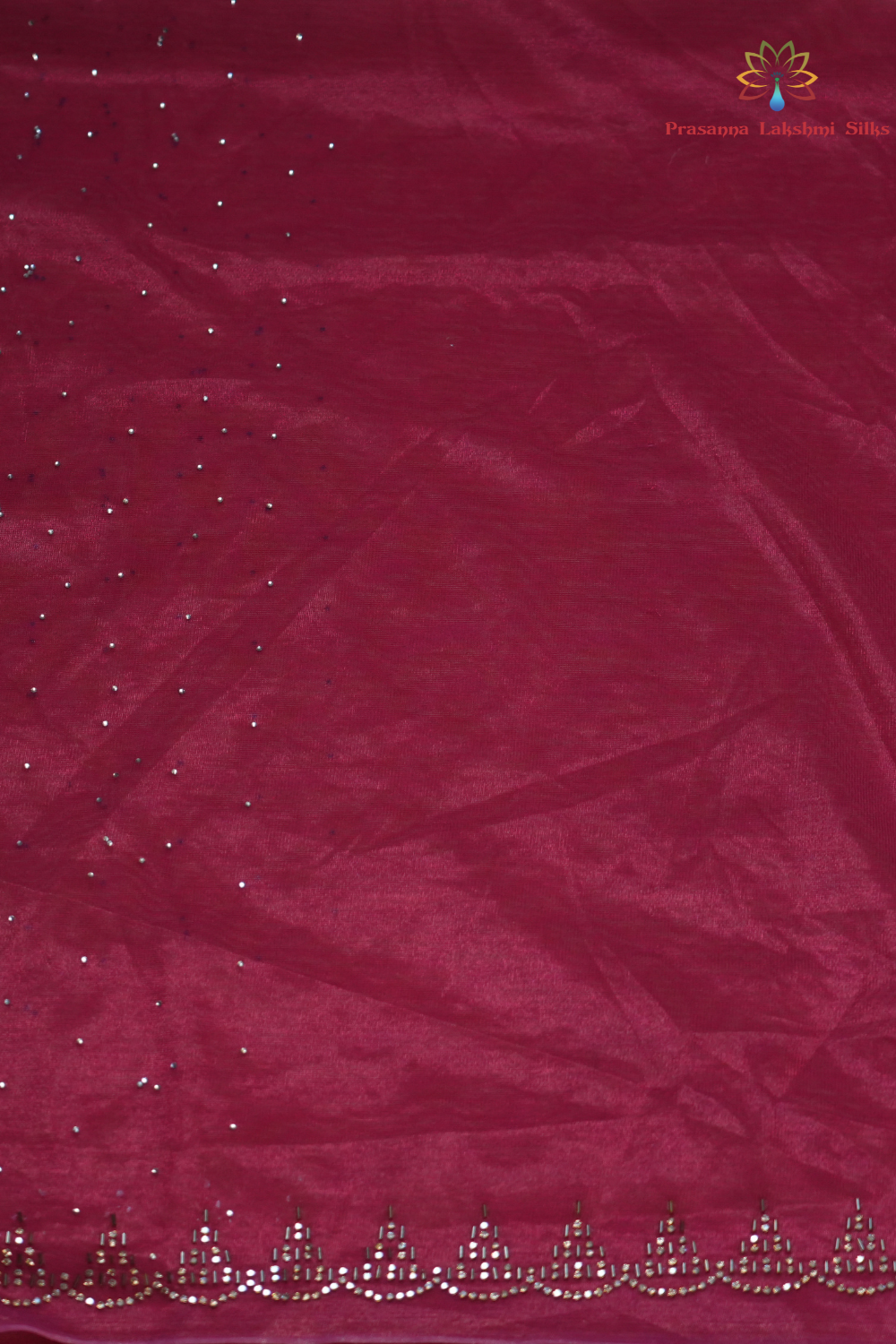 Wedding guest tissue net saree paired with running blouse piece suitable for festive occasions.