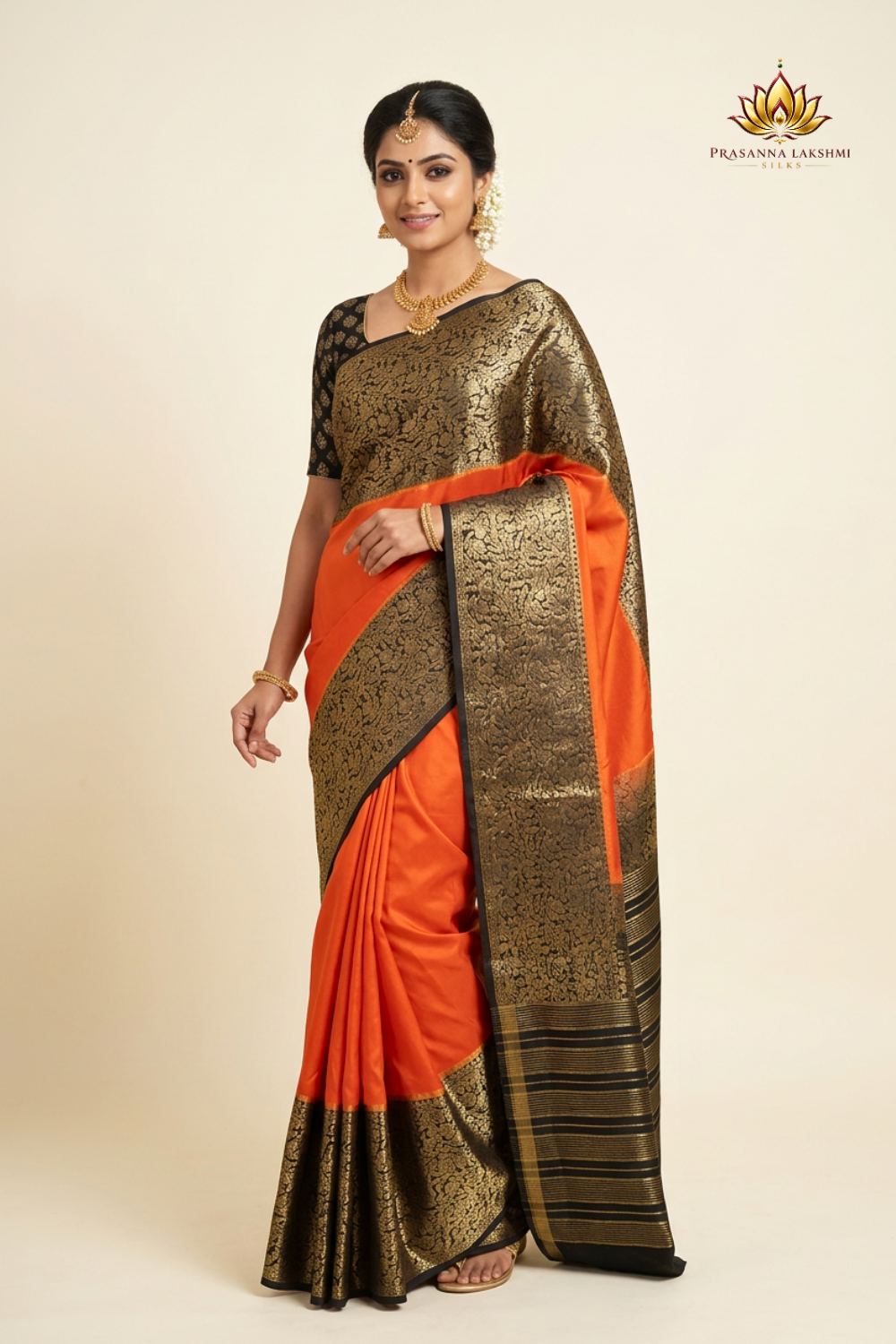 Orange and Black Semi Mysore Silk Saree with zari woven borders and rich brocade pallu with matching running blouse.
