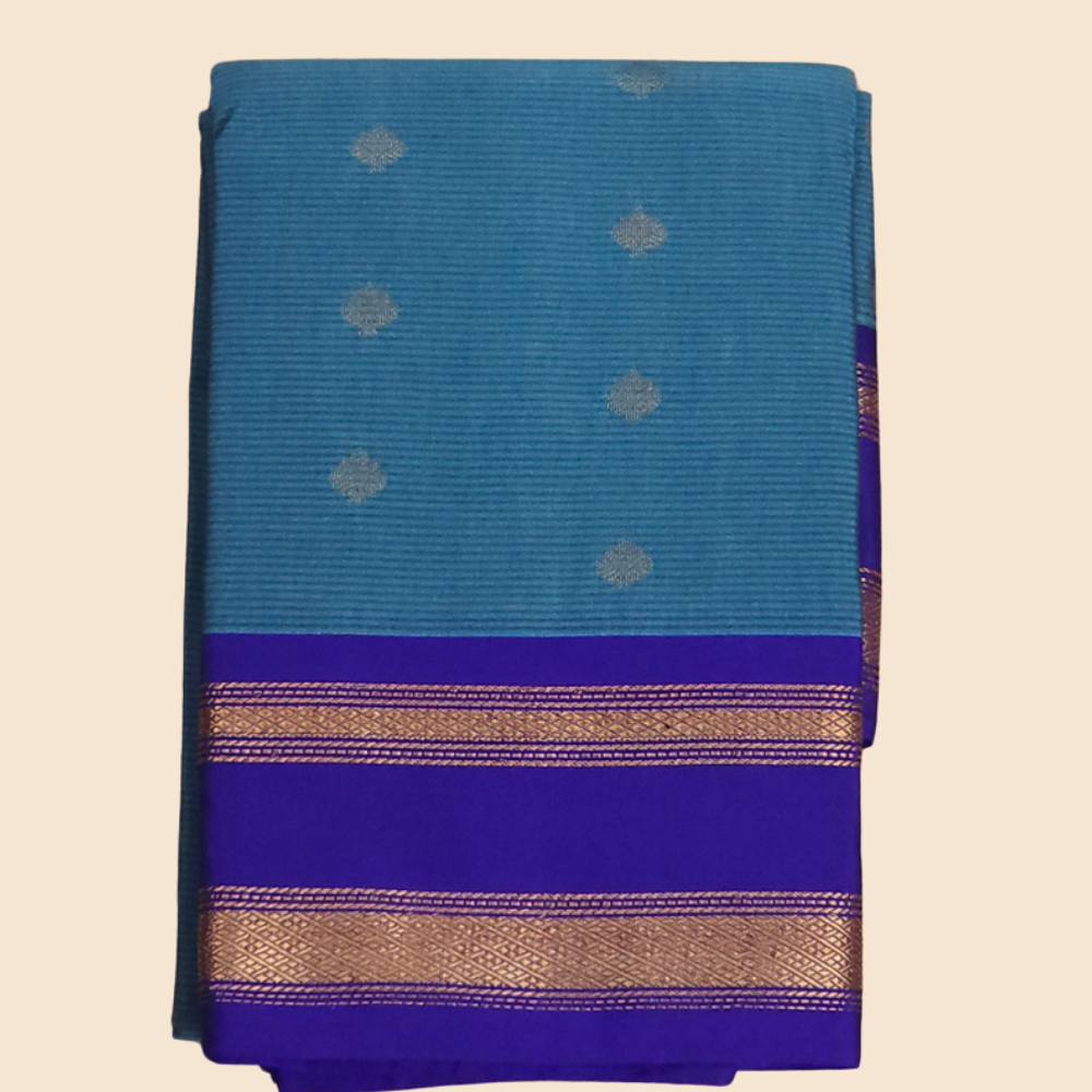 Handloom semi Gadwal saree featuring rich brocade pallu and contrast blouse
