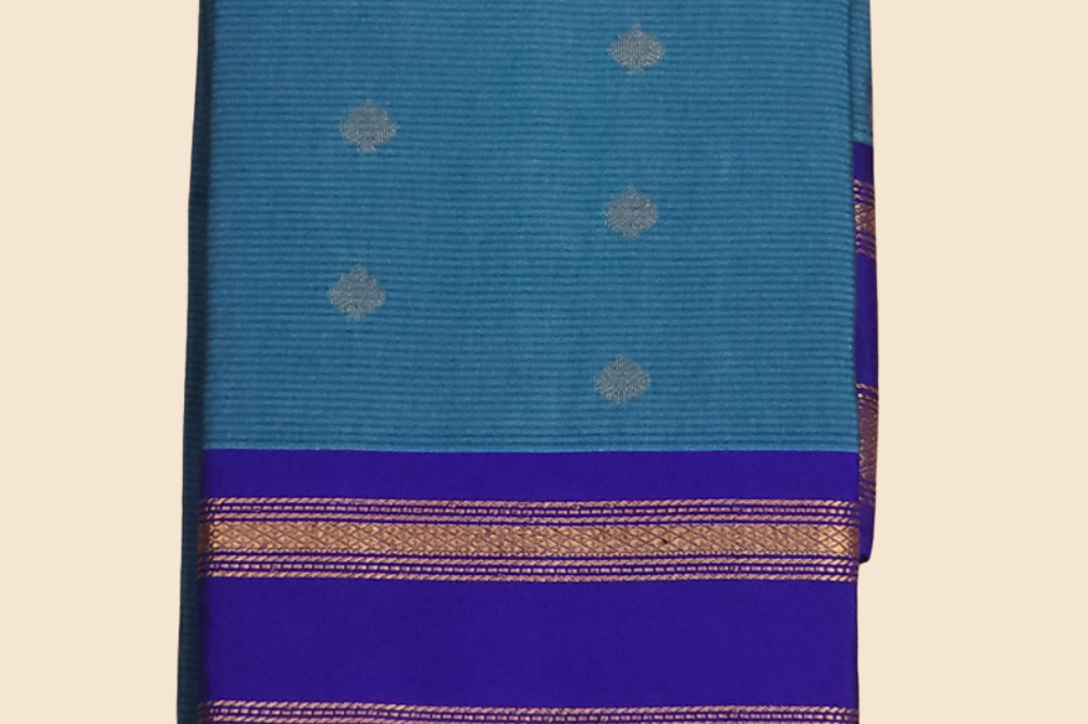 Handloom semi Gadwal saree featuring rich brocade pallu and contrast blouse
