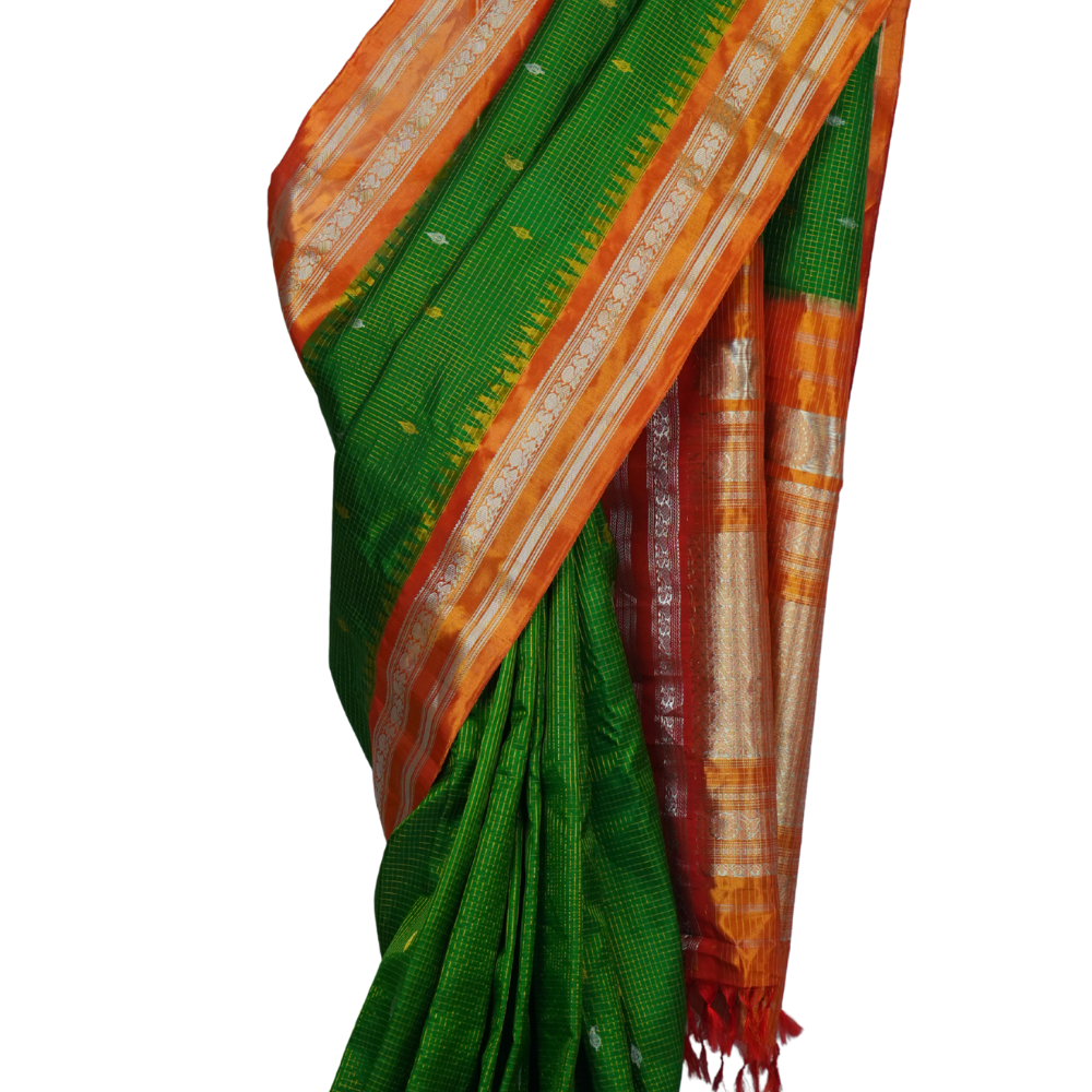Handloom Gadwal pure tissue silk saree with intricate zari motifs and muniya borders.
