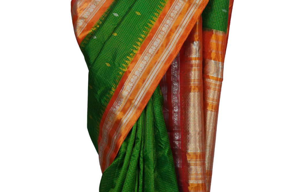 Handloom Gadwal pure tissue silk saree with intricate zari motifs and muniya borders.
