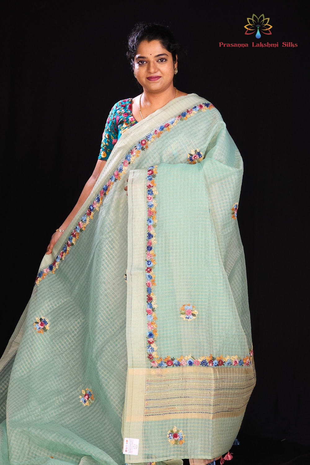 Sea foam Green Designer organza saree with embroidered borders