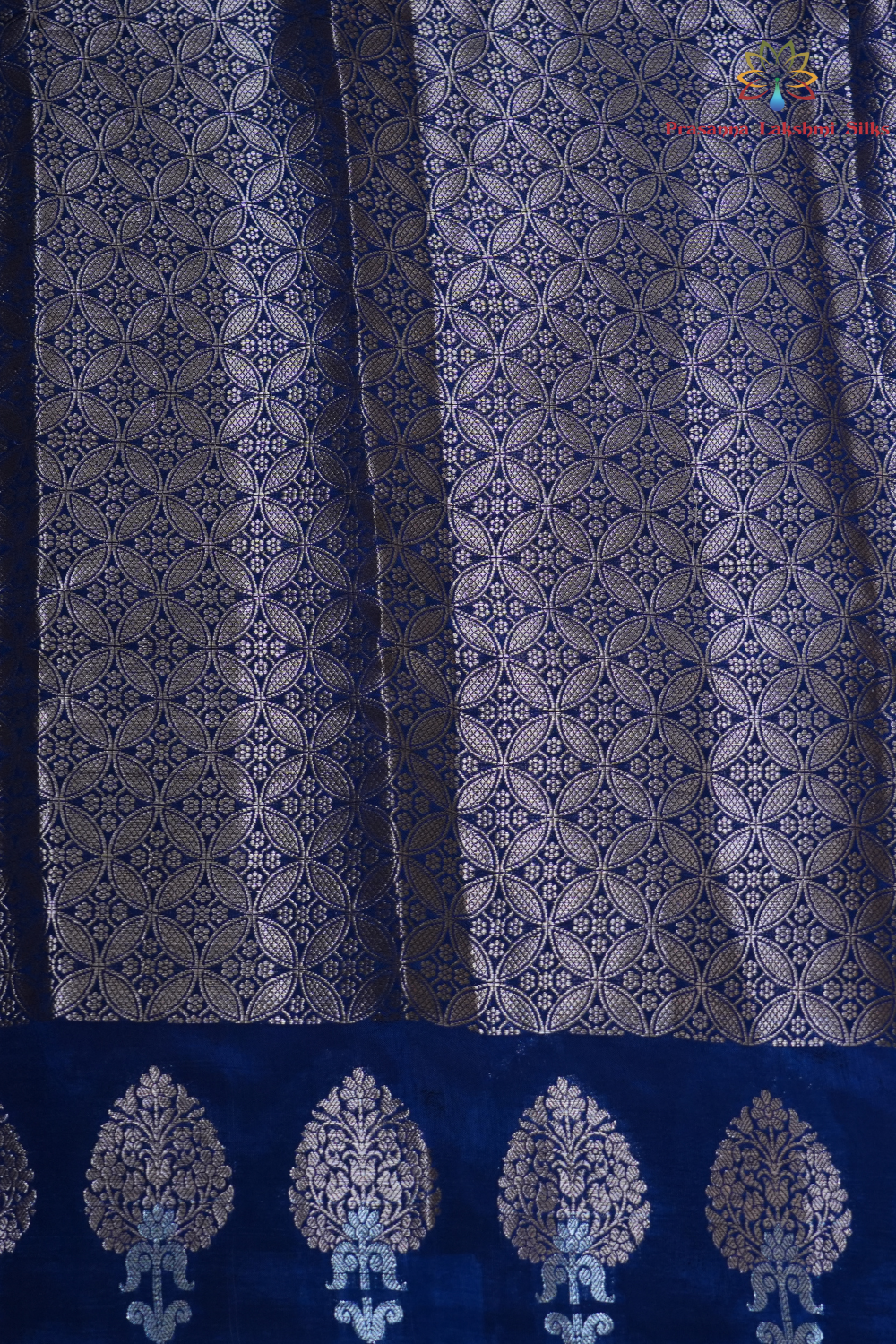 Elegant Banarasi Munga silk saree suitable for weddings and grand celebrations with intricate zari detailing.