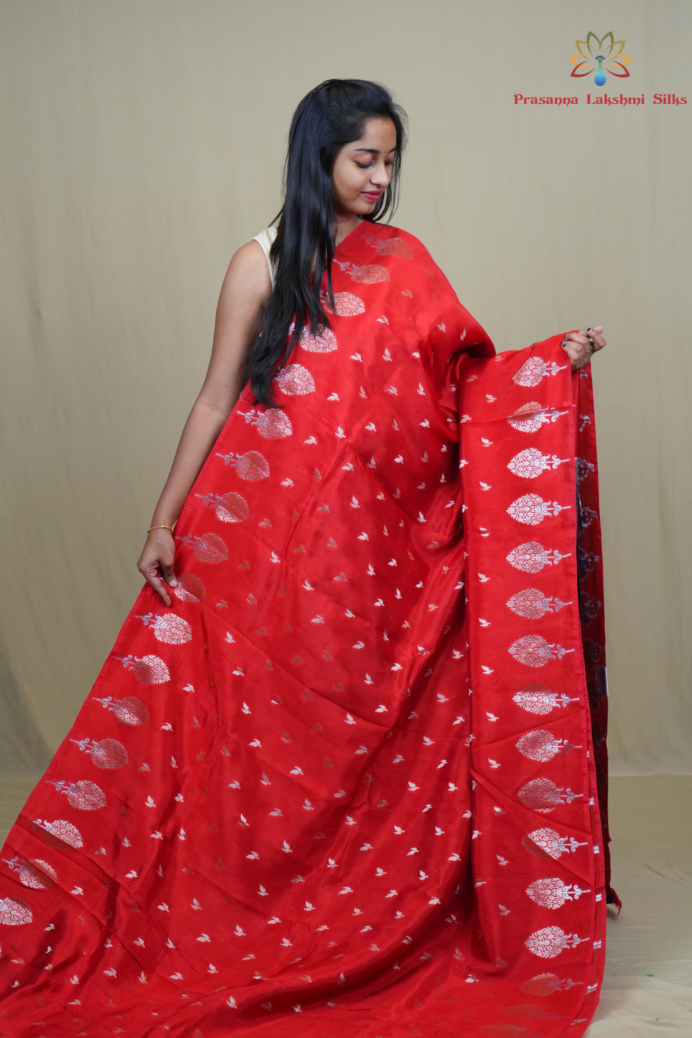 Traditional Banarasi silk saree featuring rich brocade pallu and matching brocade blouse.
