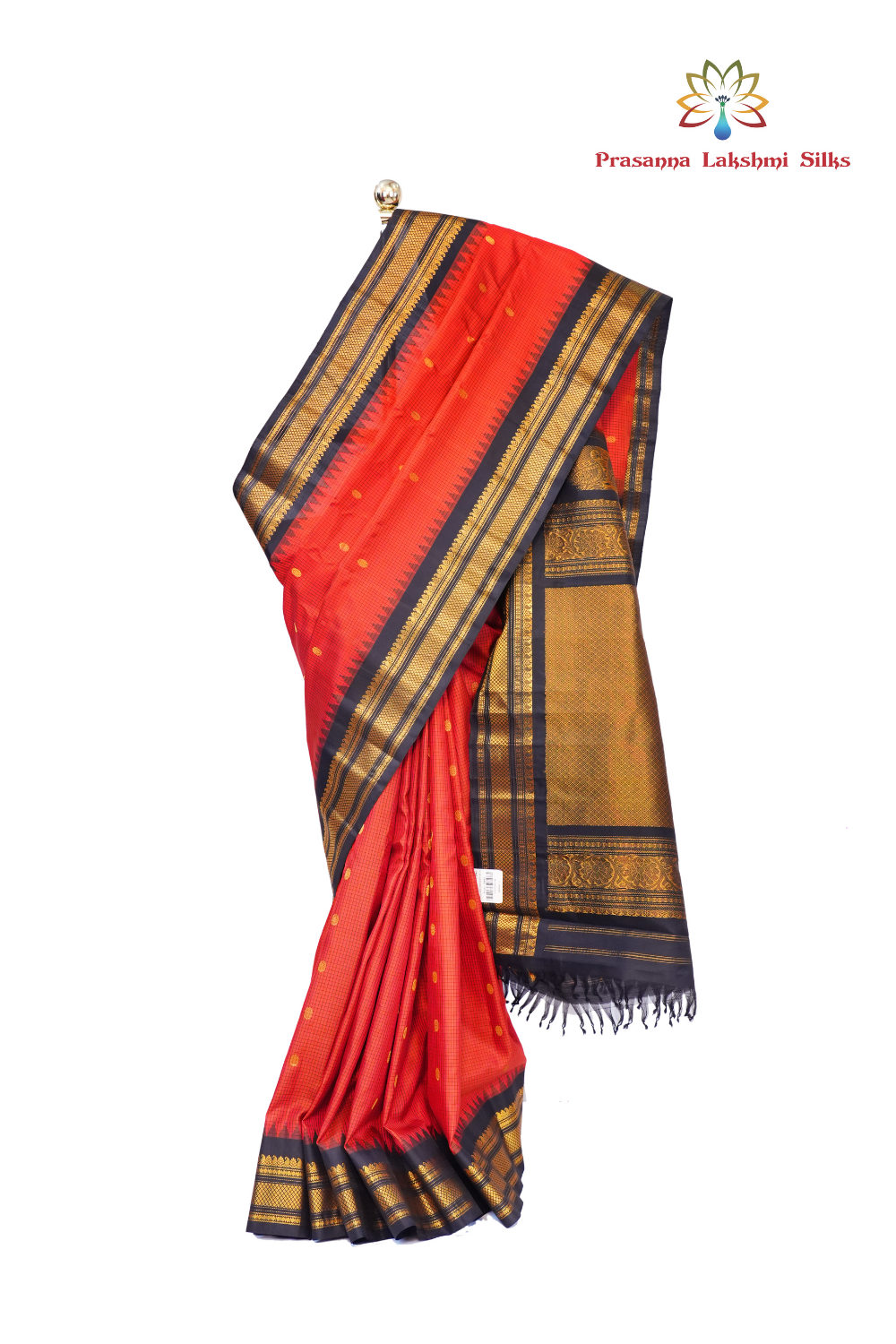 Handloom Gadwal pure silk saree with classic checks pattern and rich zari brocade pallu.
