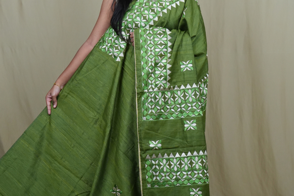 Semi Tussar silk saree with all-over thread embroidered motifs and beautiful borders.
