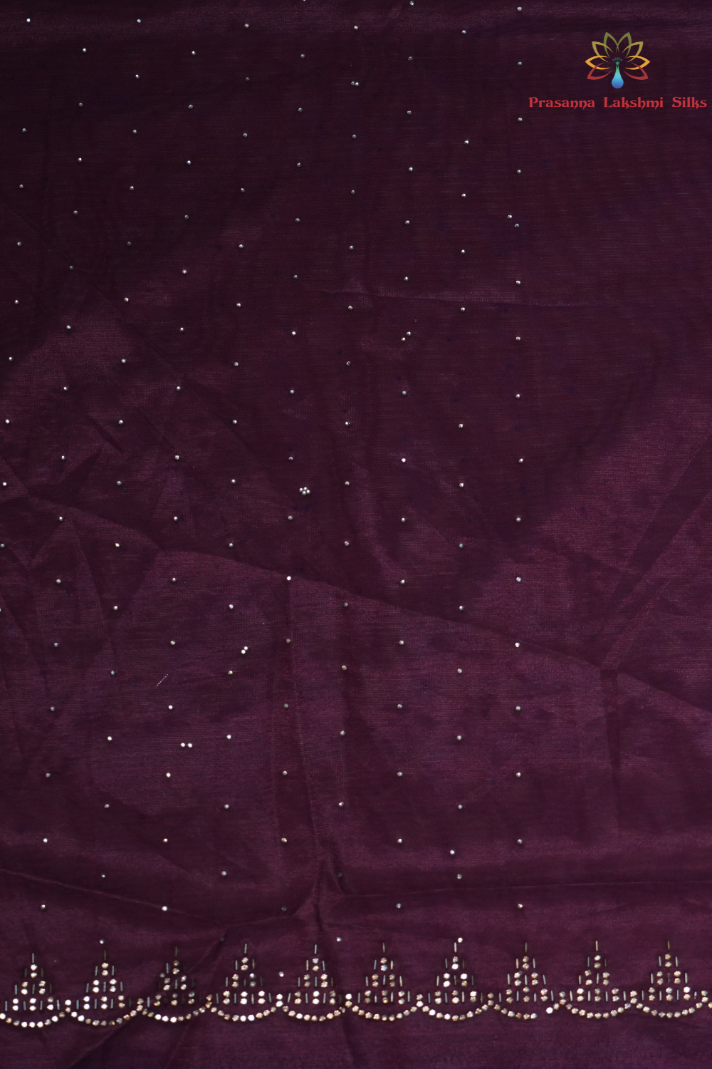Elegant ethnic tissue saree featuring cutwork borders and graceful running pallu design.
