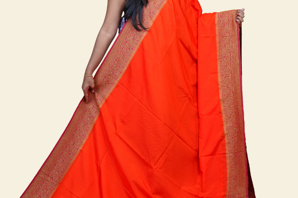 Elegant Banarasi saree featuring textured dupion silk and contrast brocade blouse
