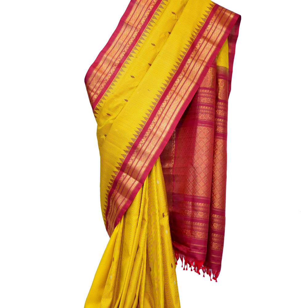 Handloom Gadwal pure silk saree with classic checks pattern and rich zari brocade pallu.
