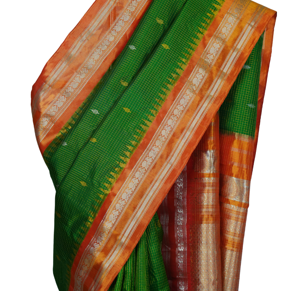 Handloom Gadwal pure tissue silk saree with intricate zari motifs and muniya borders.
