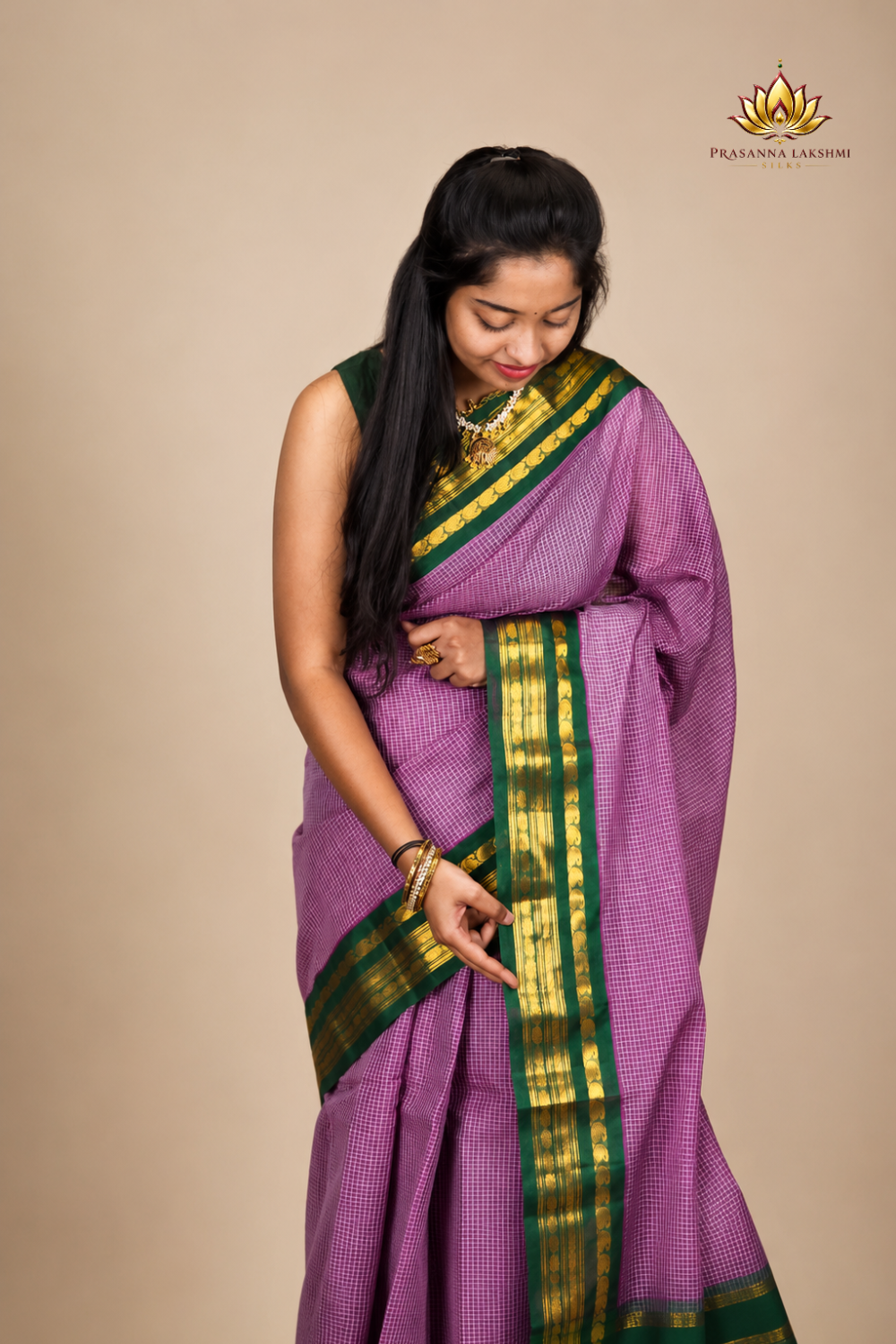Lightweight Gadwal cotton saree featuring elegant zari border and striped pallu design.

