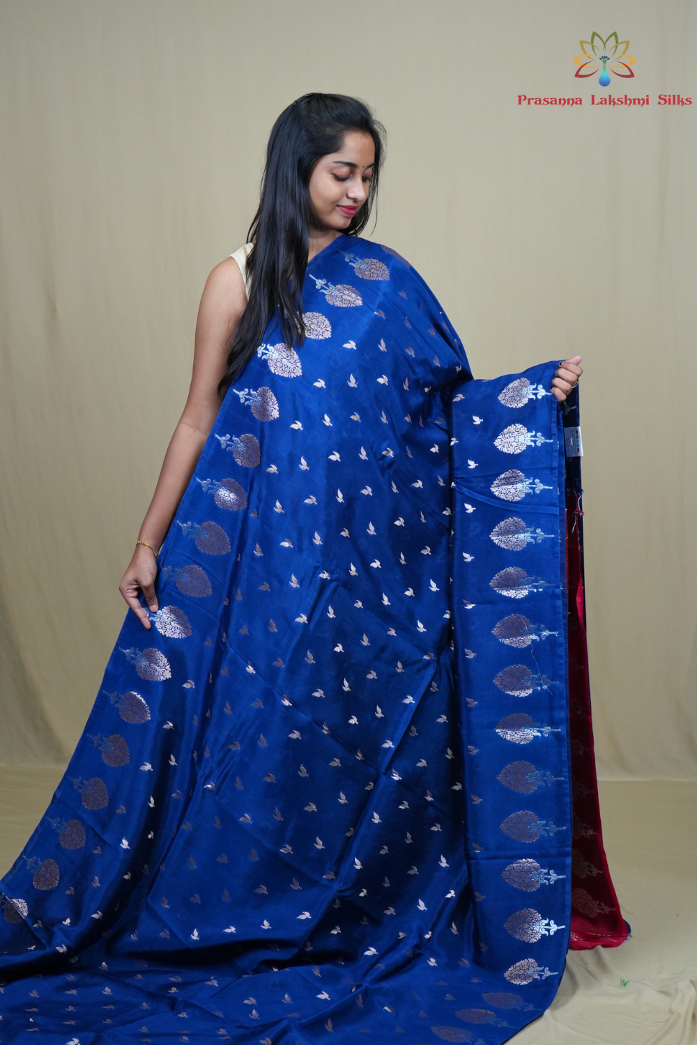 Traditional Banarasi silk saree featuring rich brocade pallu and matching brocade blouse.
