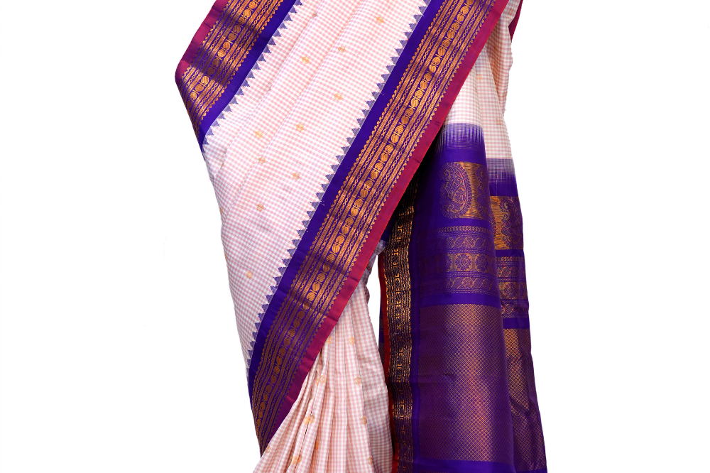 Handloom Gadwal pure silk saree with classic checks pattern and rich zari brocade pallu.

