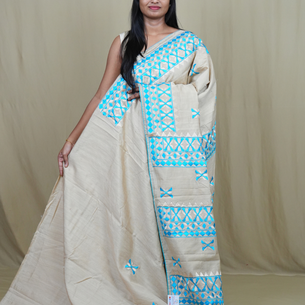 Semi Tussar silk saree with all-over thread embroidered motifs and beautiful borders.

