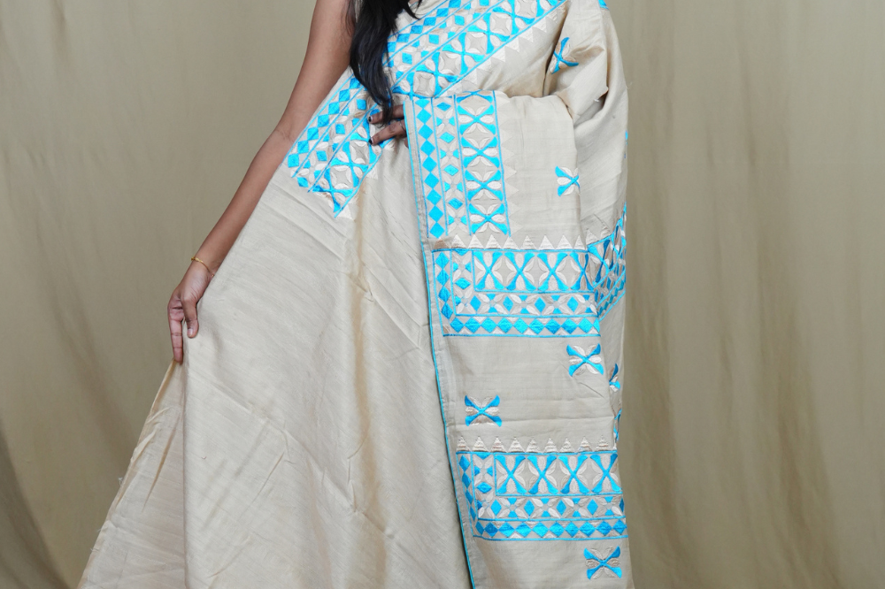 Semi Tussar silk saree with all-over thread embroidered motifs and beautiful borders.
