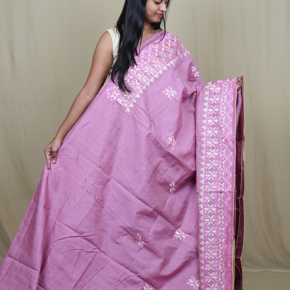 Elegant thread embroidered saree featuring rich pallu design and running blouse piece.
