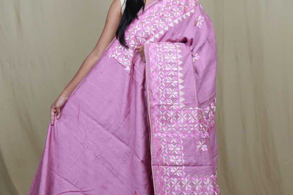 Semi Tussar silk saree with all-over thread embroidered motifs and beautiful borders.

